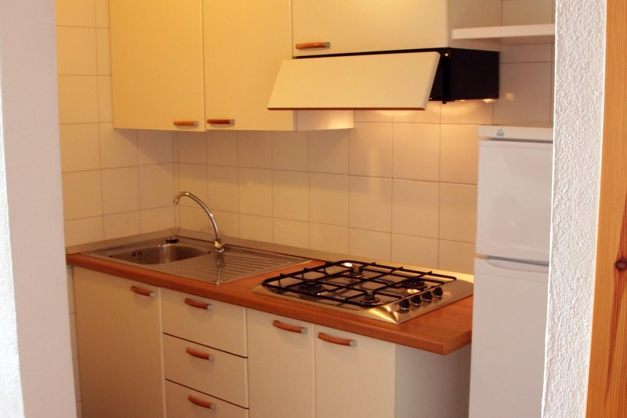 Residence Portolaconia Appartamenti กันนิโจเน ห้อง รูปภาพ