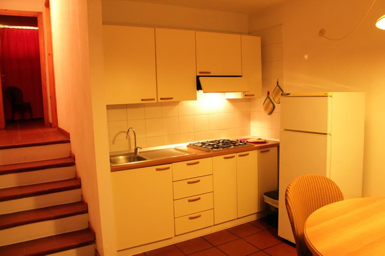 Residence Portolaconia Appartamenti กันนิโจเน ห้อง รูปภาพ